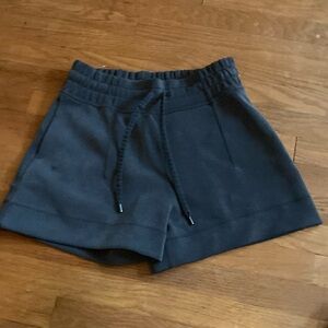 Lululemon high waisted soft material shorts with drawstring size 8